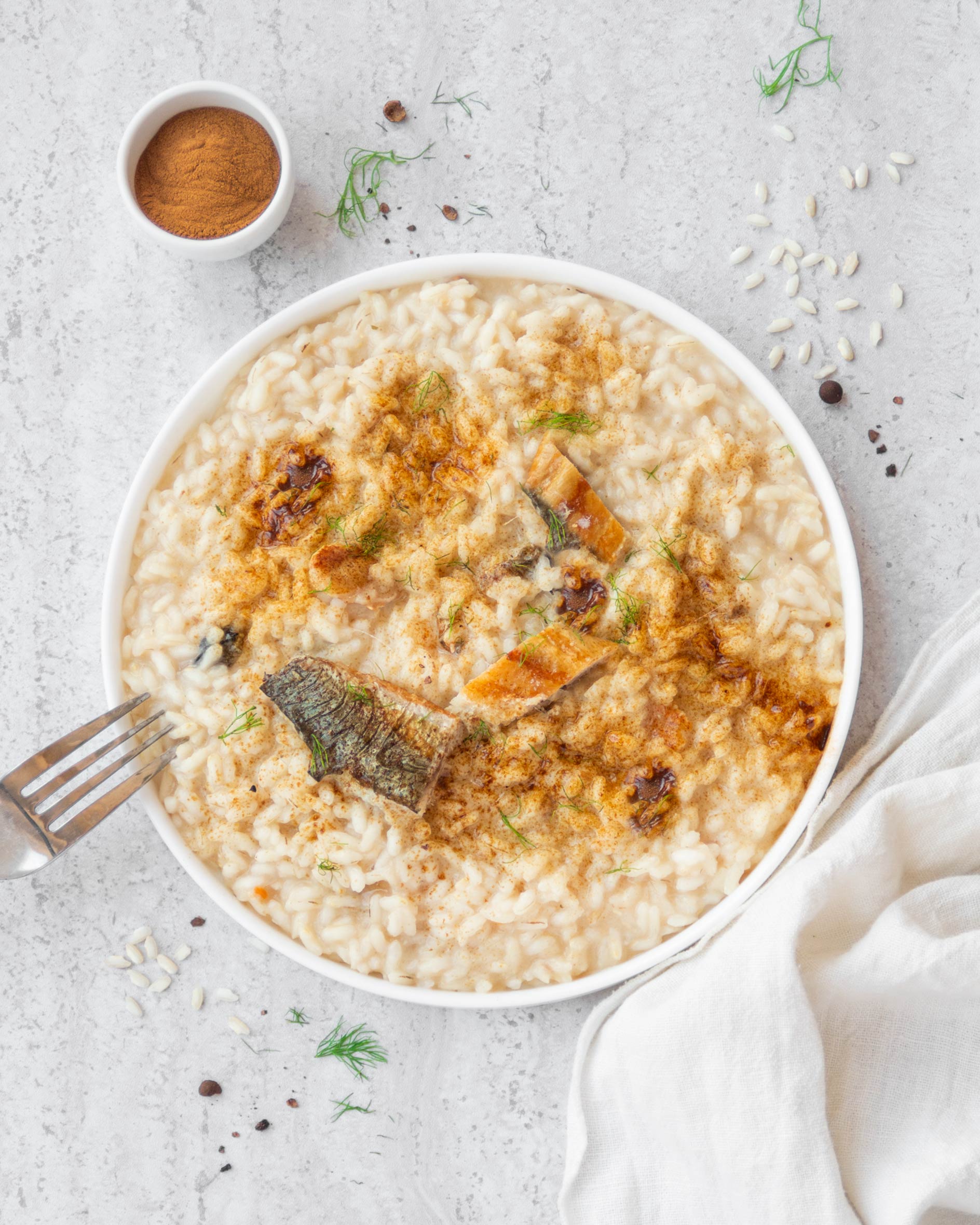 Risotto affumicato con liquirizia e aringa