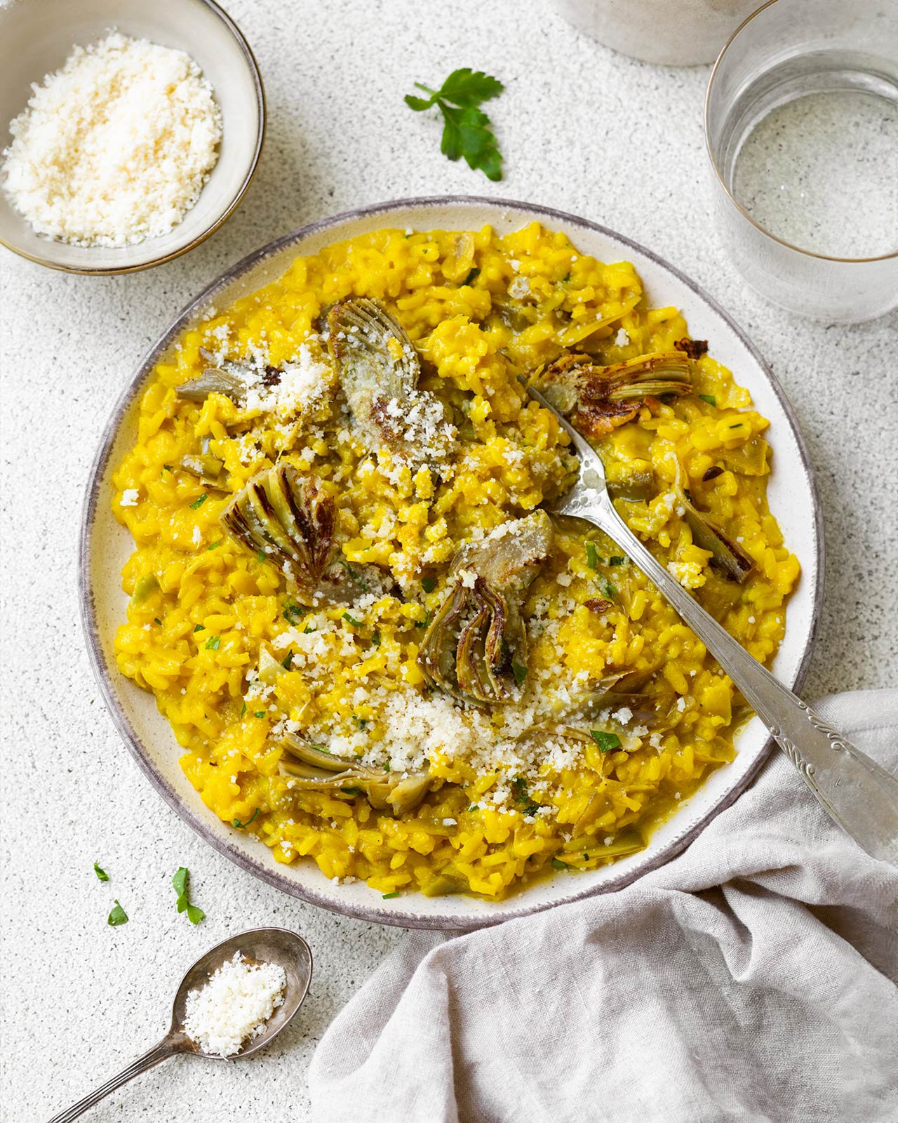 Risotto alla curcuma, carciofi e pecorino
